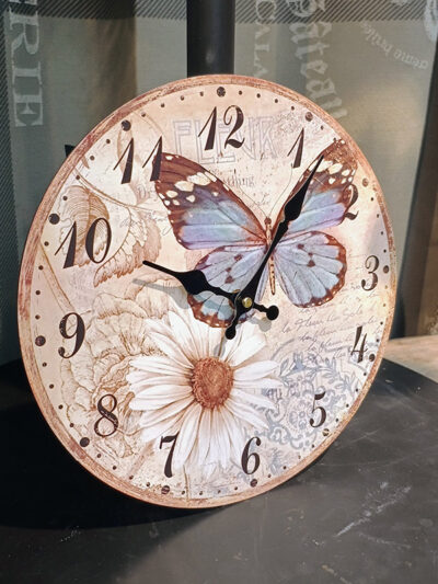 Reloj tonos dorados mariposa