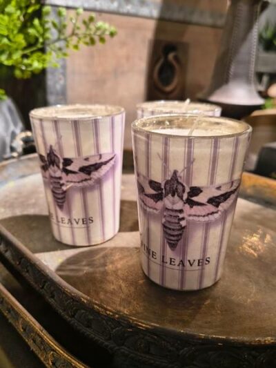 Vela en vidrio mariposa